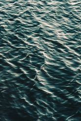 Hojo, Akira. “Rippling Dark Teal Water Surface.” Unsplash Licence, 2019.