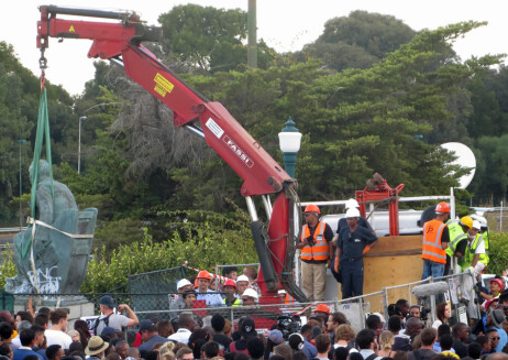 Statue of Cecil John Rhodes being removed from the University of Cape Town campus, April 2015. <br />
[Source: Wikimedia commons: https://commons.wikimedia.org/wiki/File:Goodbye_Cecil_John_Rhodes20_(16481463023).jpg ]
